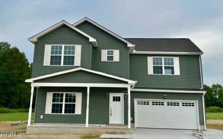 view of front of home with a garage