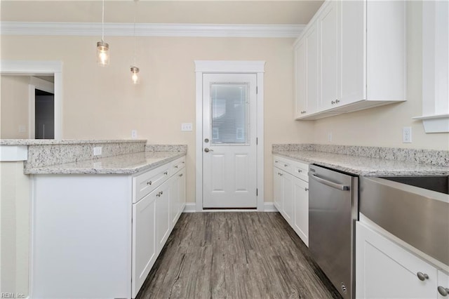 kitchen featuring pendant lighting, white cabinetry, dishwasher, and kitchen peninsula