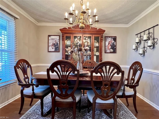 dining room featuring crown molding, dark wood-type flooring, and a chandelier