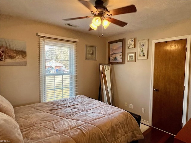 bedroom featuring ceiling fan