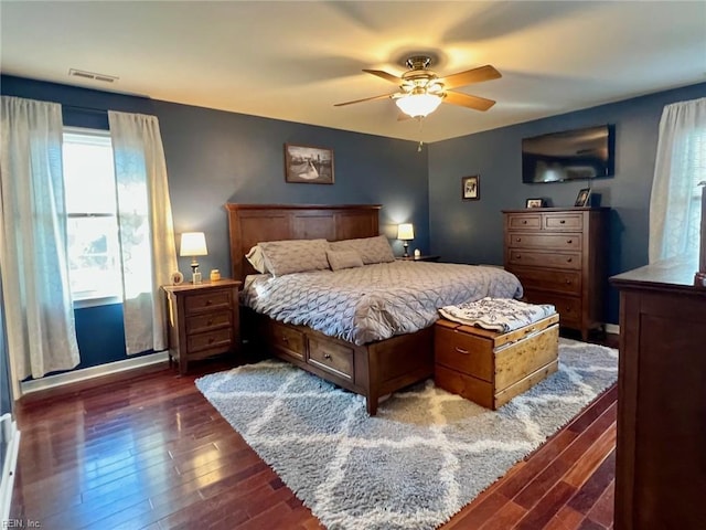 bedroom featuring dark hardwood / wood-style floors and ceiling fan