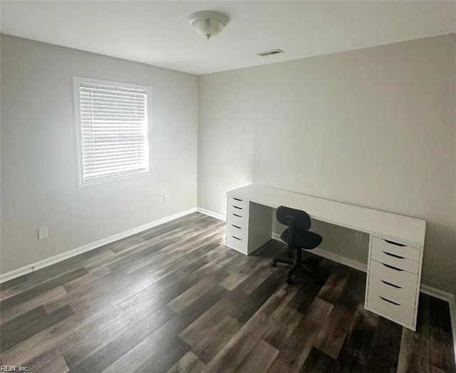 unfurnished office featuring dark wood-type flooring