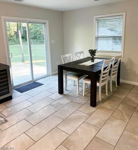 dining room with light tile patterned floors