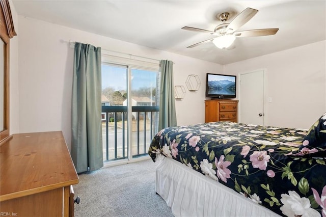 carpeted bedroom with ceiling fan and access to outside