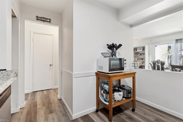 corridor featuring light hardwood / wood-style flooring