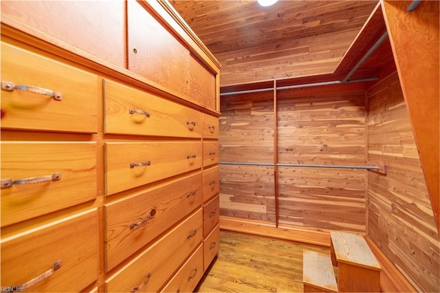 walk in closet featuring light hardwood / wood-style flooring