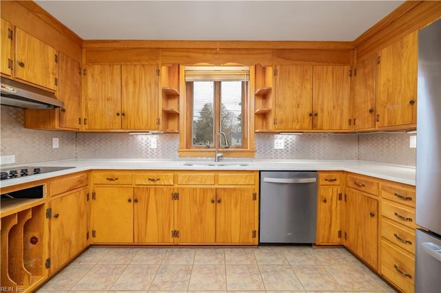 kitchen featuring stainless steel appliances, tasteful backsplash, sink, and light tile patterned flooring