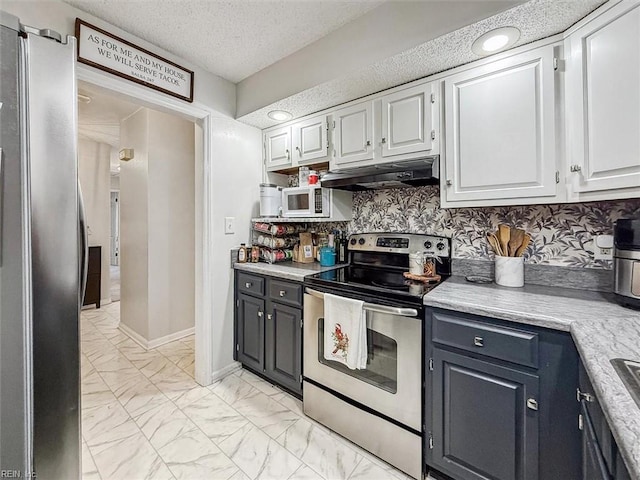 kitchen with white cabinetry, tasteful backsplash, stainless steel appliances, and a textured ceiling