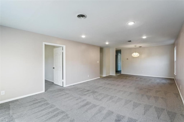 unfurnished room featuring carpet floors