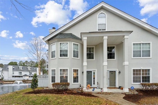 view of front of house featuring a front yard