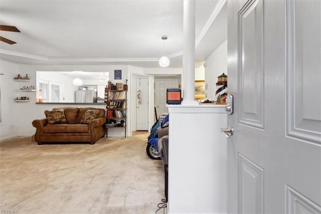 living room with ceiling fan and carpet