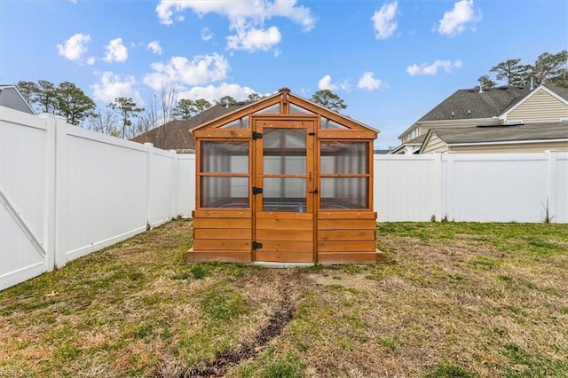 view of outdoor structure featuring a yard