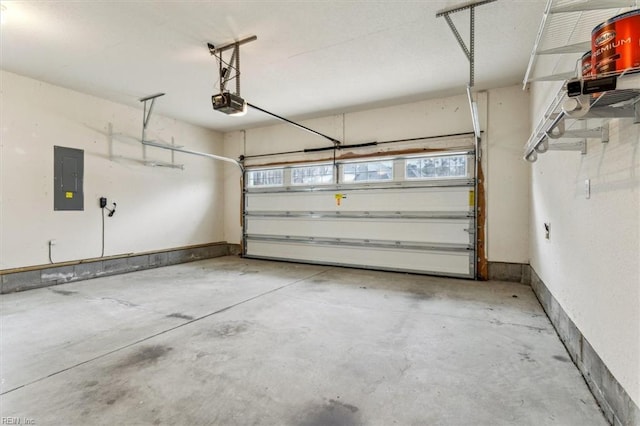 garage featuring a garage door opener and electric panel