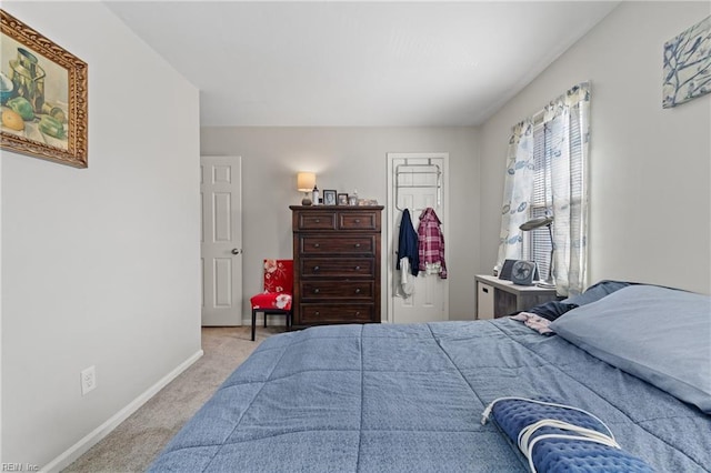 bedroom with light colored carpet