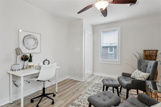 office area with ceiling fan and light wood-type flooring