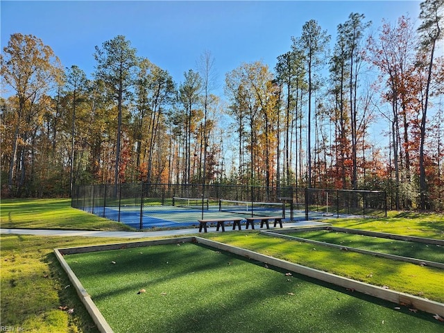 surrounding community featuring tennis court