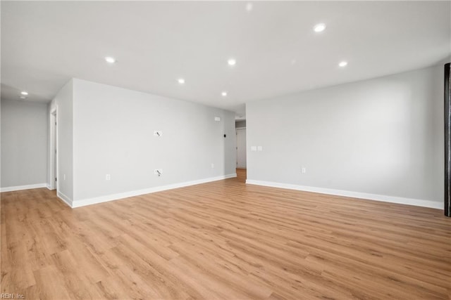 unfurnished room featuring light wood-type flooring