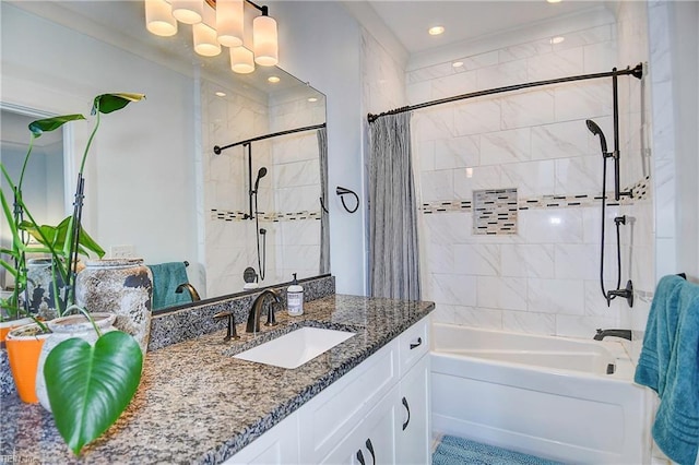 bathroom featuring vanity and shower / bath combo