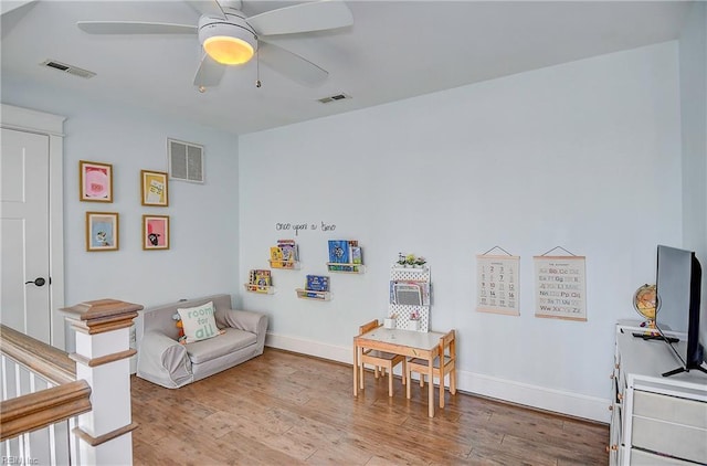 interior space featuring light hardwood / wood-style floors and ceiling fan