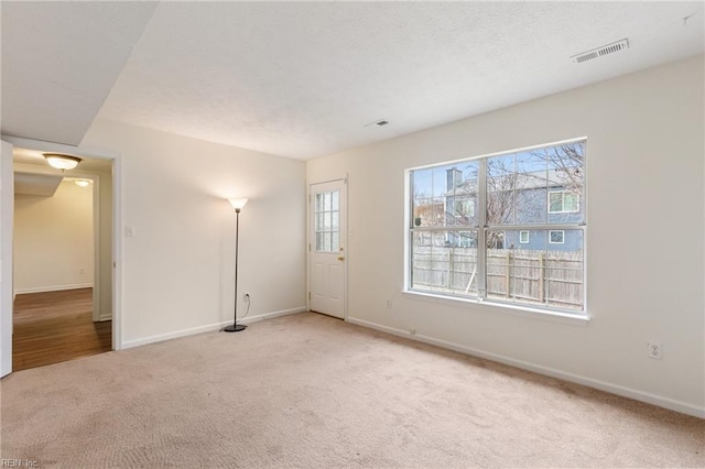 view of carpeted spare room