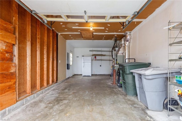 garage featuring white refrigerator