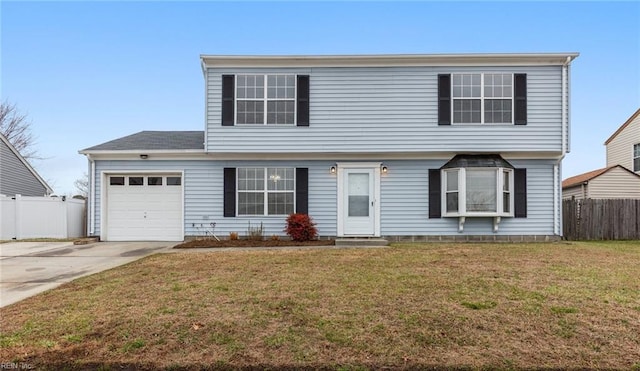 view of front facade with a garage and a front lawn