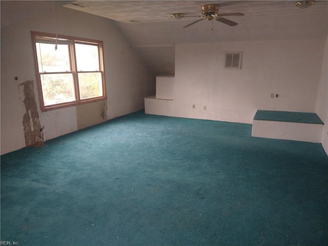 additional living space featuring lofted ceiling, carpet floors, and ceiling fan