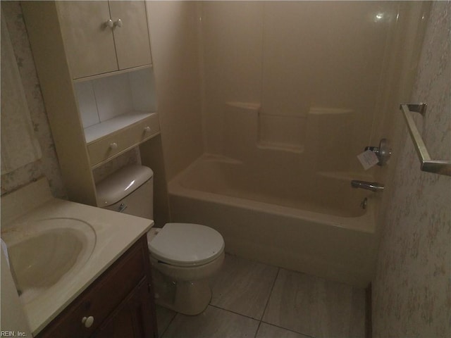 full bathroom with vanity, washtub / shower combination, and toilet