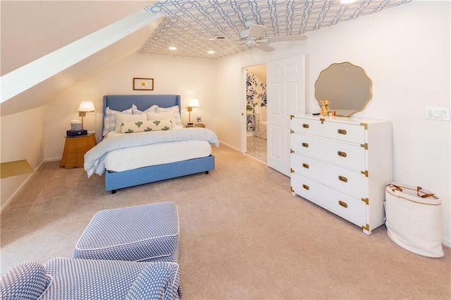 bedroom with ceiling fan, light colored carpet, and lofted ceiling