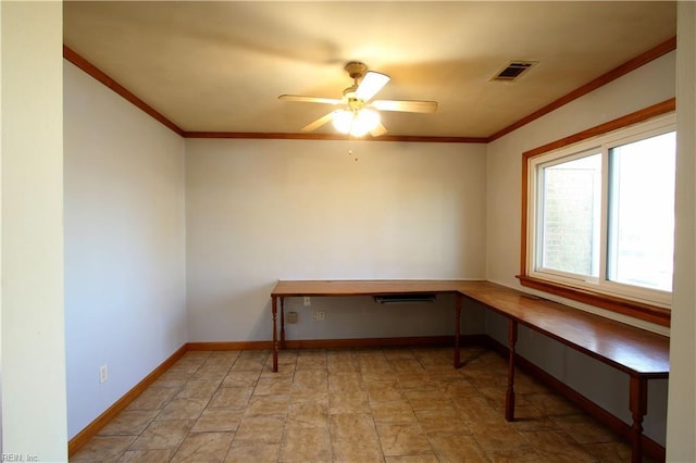 home office with ceiling fan, ornamental molding, and built in desk