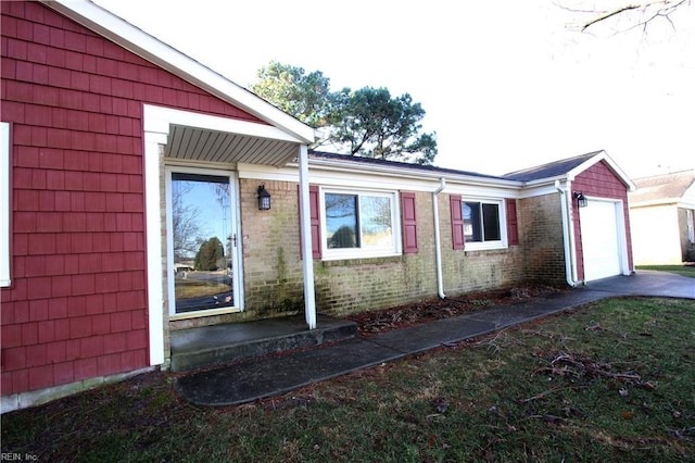 view of side of property featuring a garage