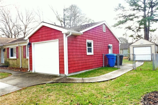 garage with a lawn