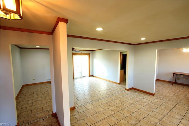 unfurnished room featuring ornamental molding and ceiling fan