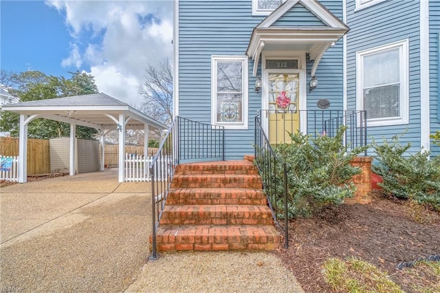 entrance to property with a carport