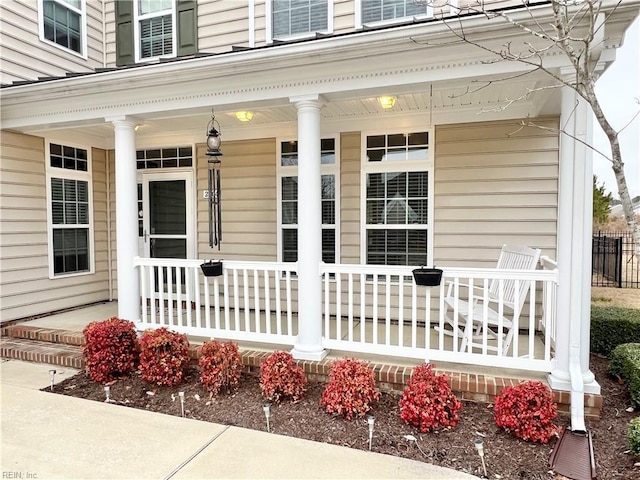 doorway to property featuring a porch