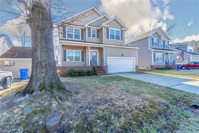 view of front of house featuring a garage and a front lawn