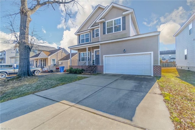 view of front of house with a porch, a garage, and a front lawn