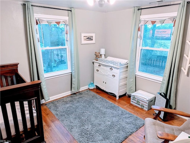 bedroom featuring light wood-type flooring