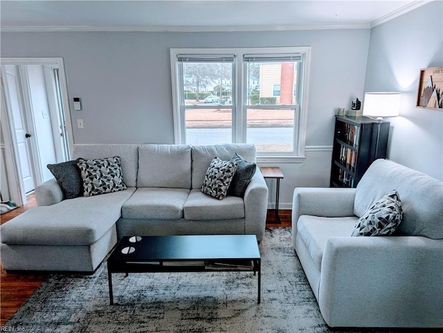 living room featuring hardwood / wood-style flooring and crown molding