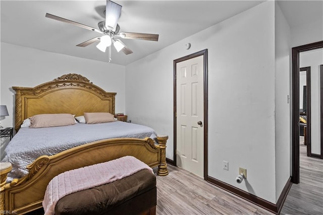 bedroom featuring ceiling fan and light hardwood / wood-style flooring