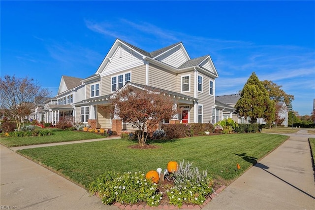 view of front facade with a front yard