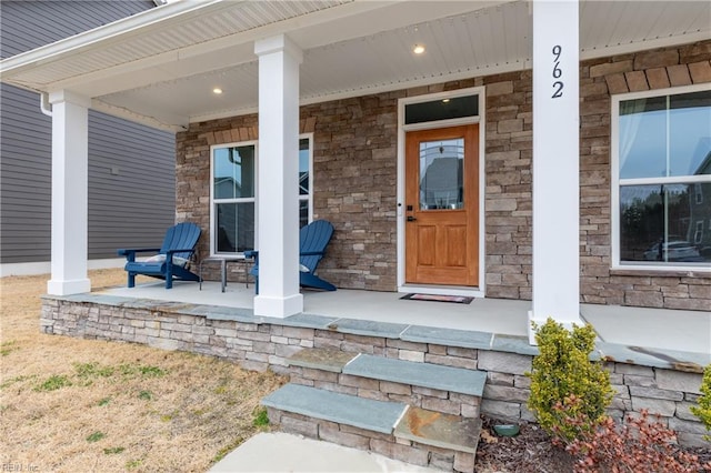 doorway to property with covered porch