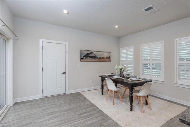 dining room with light wood-type flooring