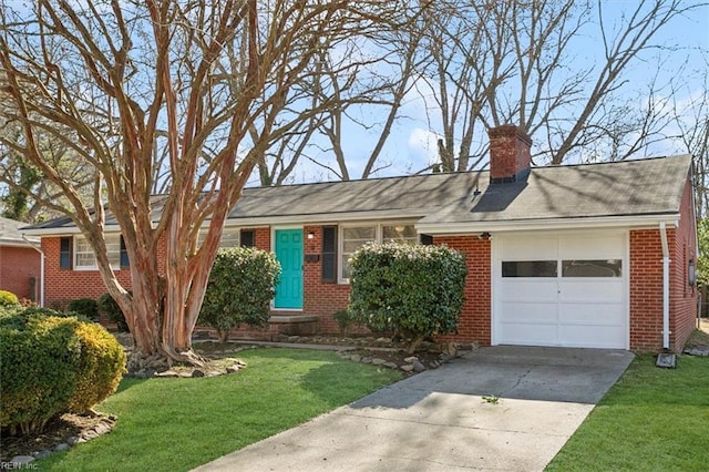 ranch-style home featuring a garage and a front yard