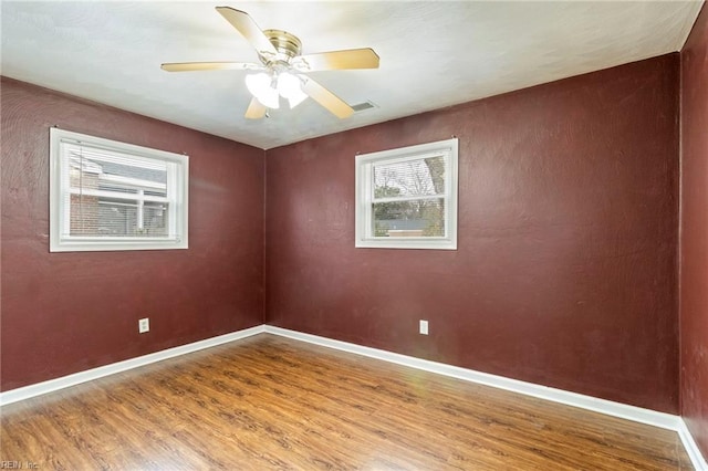 unfurnished room featuring wood-type flooring and ceiling fan