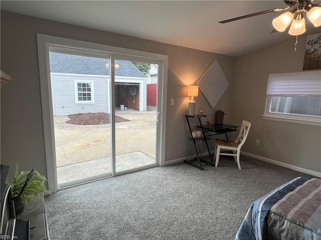 carpeted bedroom with access to exterior, vaulted ceiling, and ceiling fan