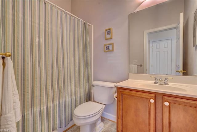 full bathroom featuring shower / tub combo, vanity, toilet, and tile patterned flooring