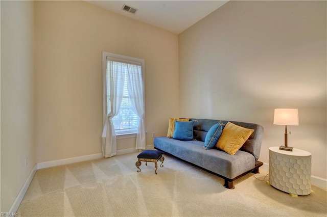 living area with carpet flooring