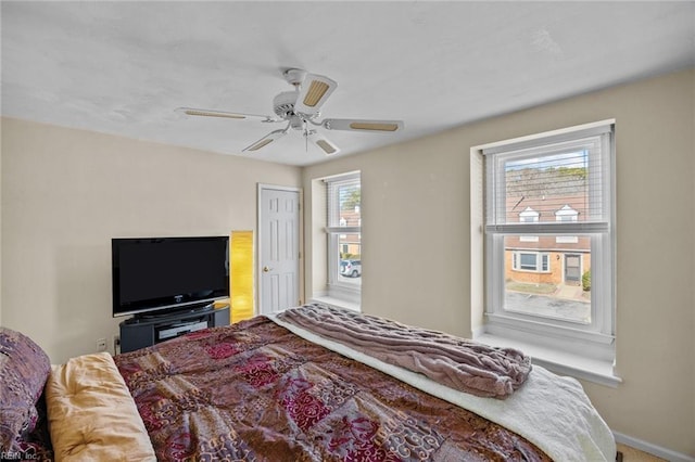 bedroom featuring ceiling fan