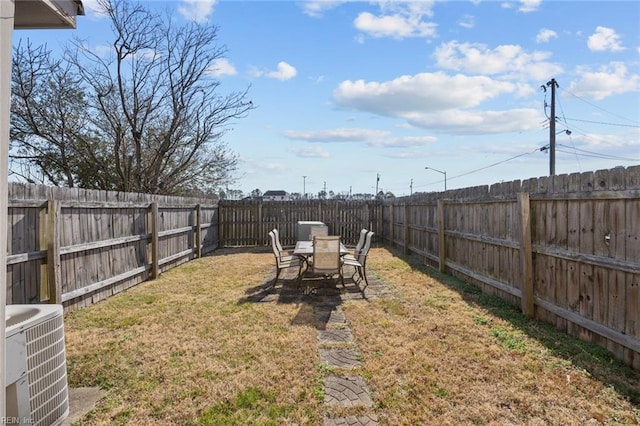 view of yard with central AC unit